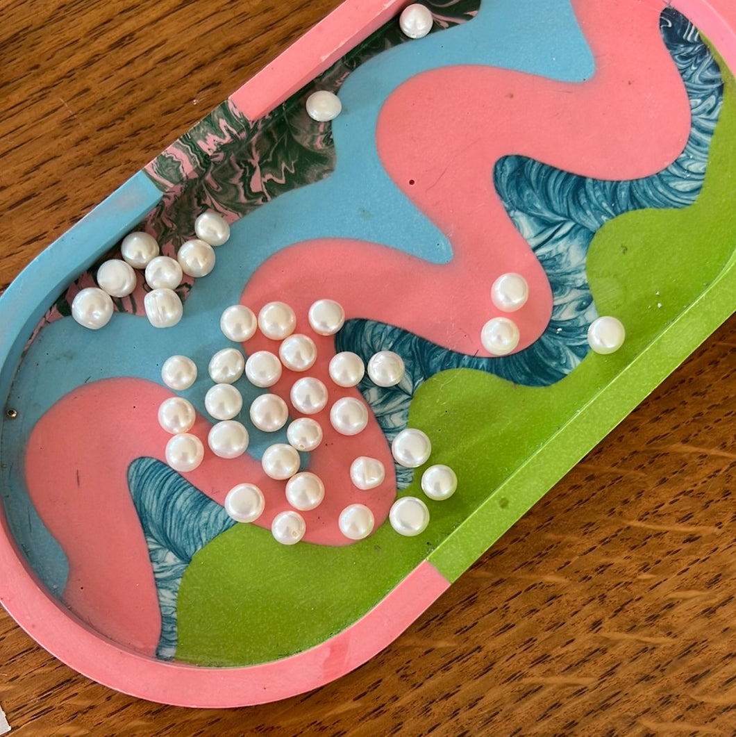 Extra pearls added to necklace